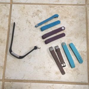 Fitbit Alta size small with 4 extra bands.